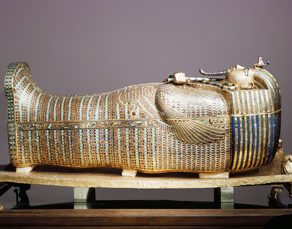 The second mummiform coffin made from gold-plated wood inlaid with glass-paste, from the tomb of the pharaoah Tutankhamun, discovered in the Valley of the Kings, Thebes, Egypt, North Africa, Africa