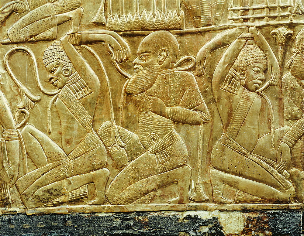 Detail from a state chariot showing the vanquished and enslaved enemies of Egypt, from the tomb of the pharaoh Tutankhamun, discovered in the Valley of the Kings, Thebes, Egypt, North Africa, Africa