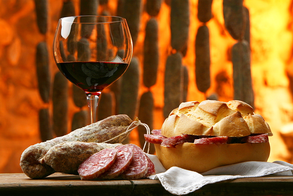 Bread with salami and Teroldego wine, Trentino Alto Adige, Italy

