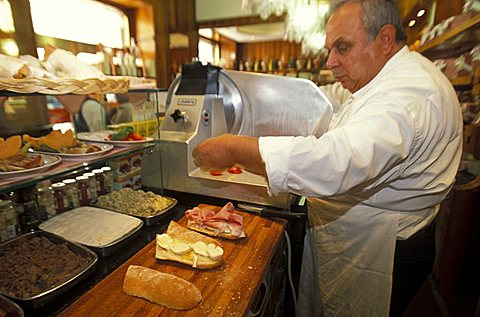 Preparation of a sandwich, Gattullo café, Milan, Lombardy, Italy