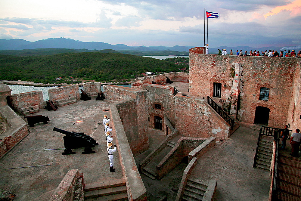 The lowering of the flag, Castle of Morro (Castillo del Morro), Santiago de Cuba, Cuba, West Indies, Central America 