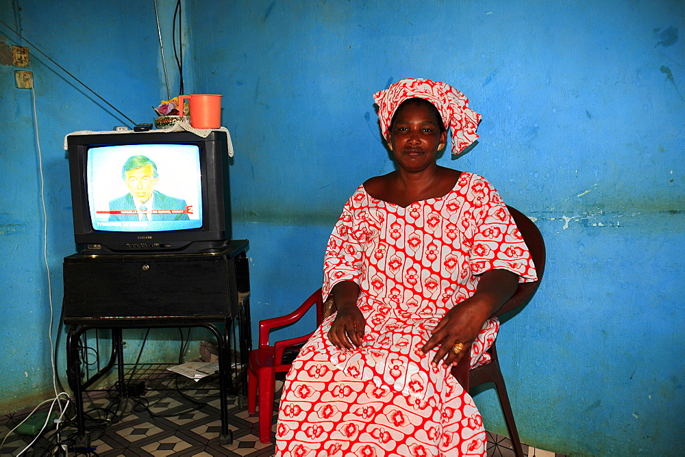 Woman wearing typical african bubu clothing, Kaolack, Republic of Senegal, Africa