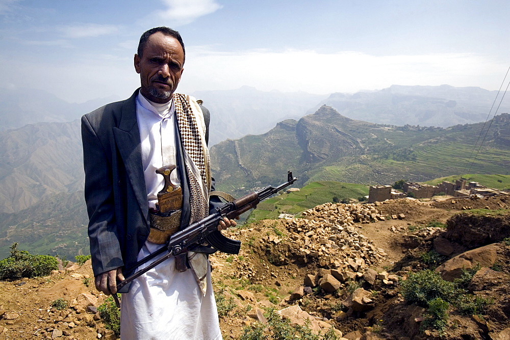 Yemeni man with kalashnikov, Al Tawila, Yemen, Middle East  