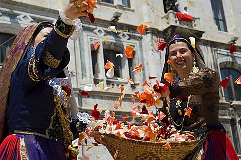 Women in traditional dress, ramadura, Sant'Efisio traditional religious feast,  Cagliari, Sardinia, Italy