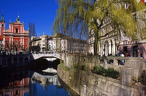 The Cathedral and Plecnik Three Bridges on Ljubljanica river, City center, Ljubljana, Slovenia, Europe