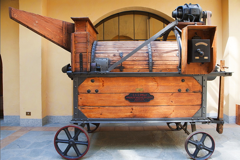 Contratto wine producer in Canelli, an ancient multipurpose machine for pressing wine named "pigia-deraspatrice", Asti, Piedmont, Italy