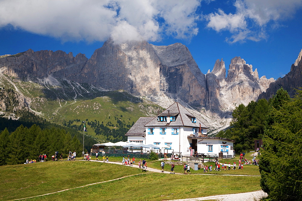 Ciampedie hut, in the background Catinaccio mountain and Torri del Vajolet, Fassa valley, Trentino Alto Adige, Italy, Europe