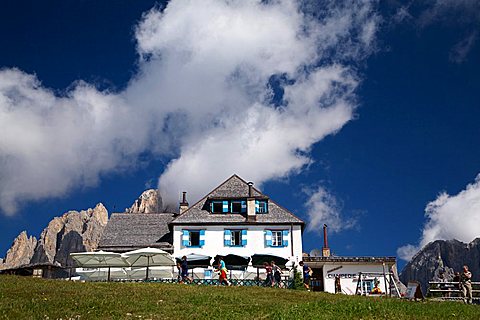 Ciampedie hut, in the background Catinaccio mountain and Torri del Vajolet, Fassa valley, Trentino Alto Adige, Italy, Europe