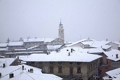 Ala village city during snowfall, Vallagarina, Trentino