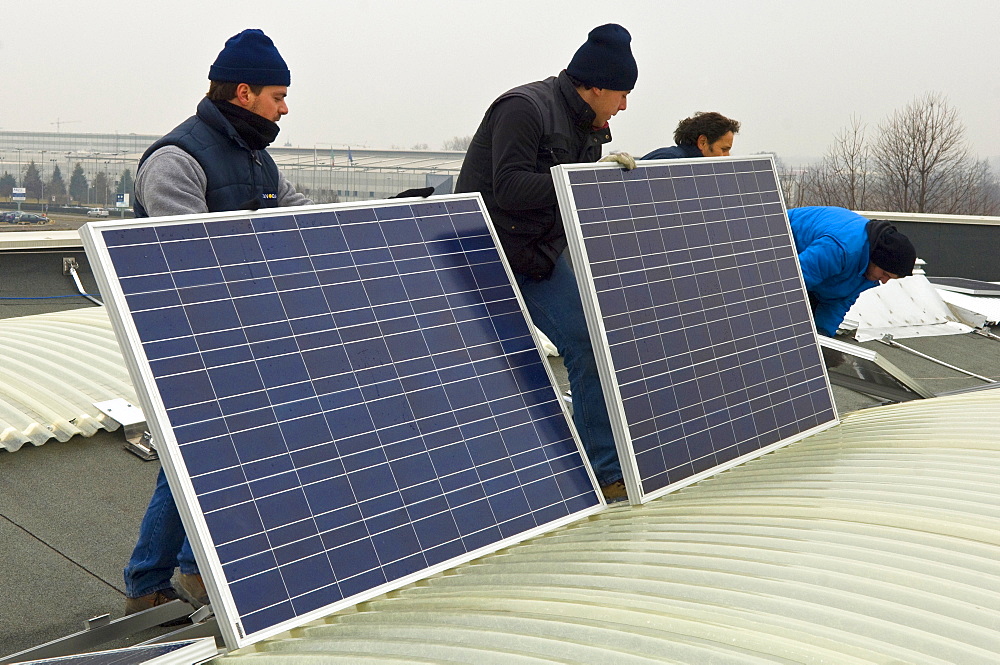 solar power system on factory roof, mapello, italy
