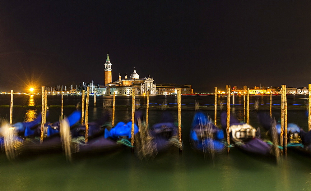 Moored gondolas in the San Marco basin, San giorgio island,Venice,Veneto,Italy, Europe