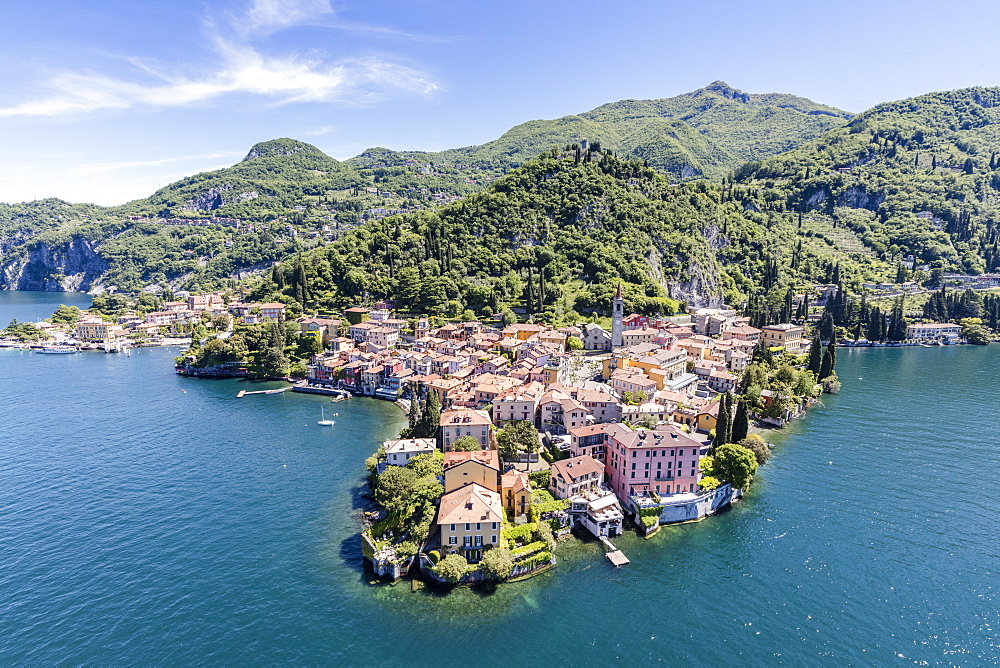 Aerial view of Varenna frames by the blue water of Lake Como on a sunny spring day, Lombardy, Italy, Europe