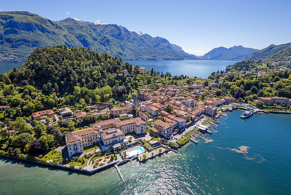 Aerial view of the turquoise waters of Lake Como and green headland that frames the village of Bellagio, Lombardy, Italy, Europe