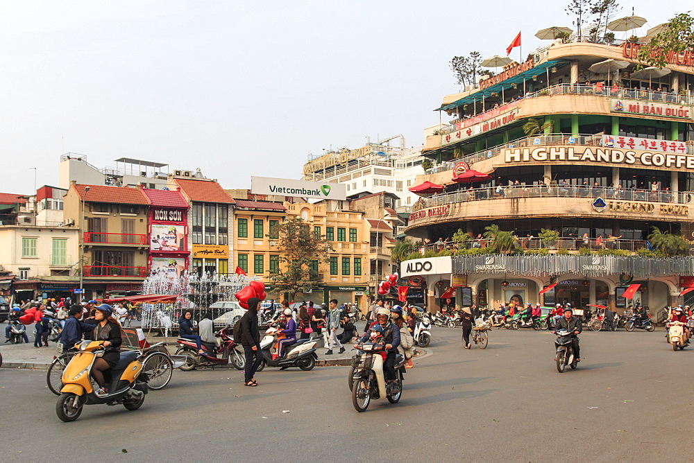 Traffic in the city center of Hanoi nearby the Hoan Kiem lake, Hanoi, Vietnam, Indochina, Southeast Asia, Asia