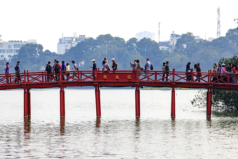 People walking on the Huc Bridge over the Hoan Kiem Lake, Hanoi, Vietnam, Indochina, Southeast Asia, Asia