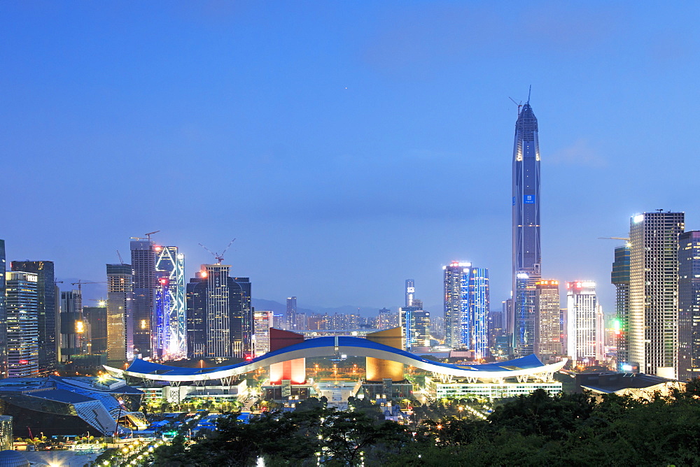 Shenzhen cityscape at dusk with the Civic Center and the Ping An IFC on foreground, China