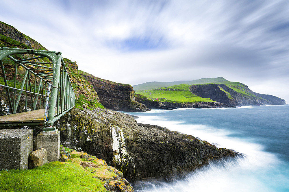 The bridge between mykinesholmur and Mykines. The island Mykines, part of the Faroe Islands in the North Atlantic, Denmark, Northern Europe