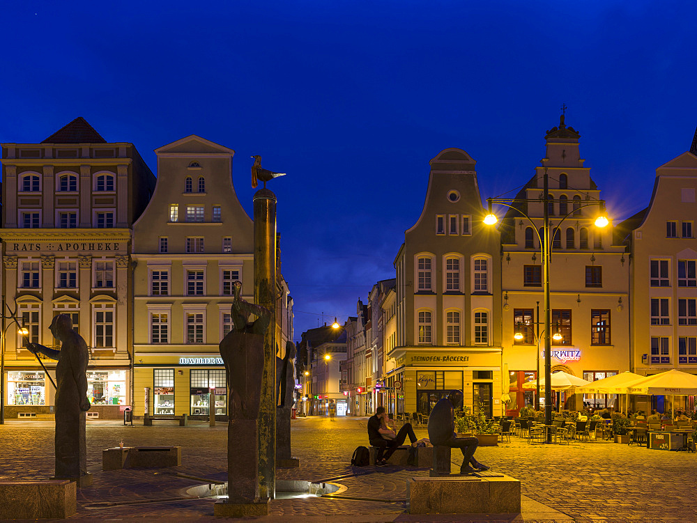 Fountain Moewenbrunnen by Waldemar Otto at the  Neuer Markt (new market). The hanseatic city of Rostock at the coast of the german baltic sea.  Europe,Germany, Mecklenburg-Western Pomerania, June