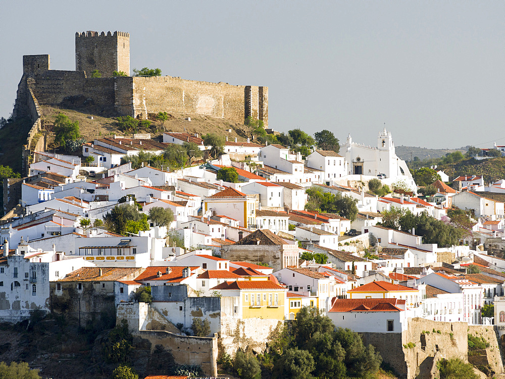 Mertola on the banks of Rio Guadiana in the  Alentejo.  Europe, Southern Europe, Portugal, March