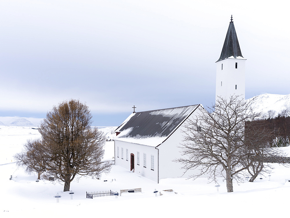 The church of Holar during winter. Holar is a famous archaeological site and is home to the Holar University Collage focusing on agriculture, horse breeding and tourism. europe, northern europe, iceland,  March