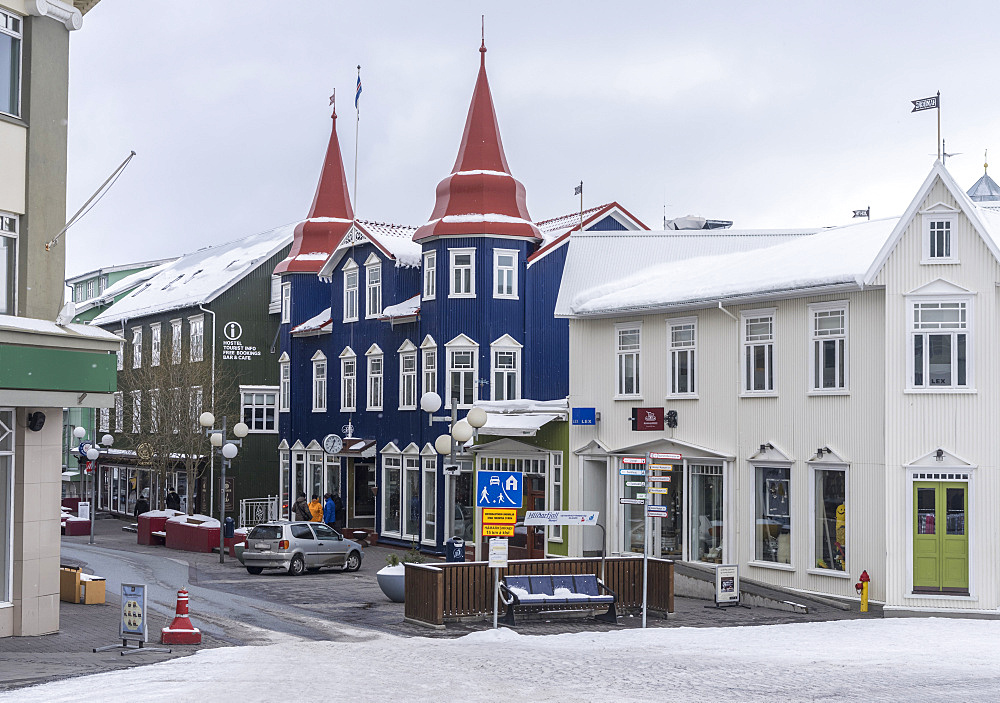 Akureyri during winter, Hafnarstraeti in the town center. The traffic calmed street is kept snow and ice free by a heating system powered by geothermal energy. Akureyri  is Icelands second largest city, second only the Reykjavik area. europe, northern europe, iceland,  March