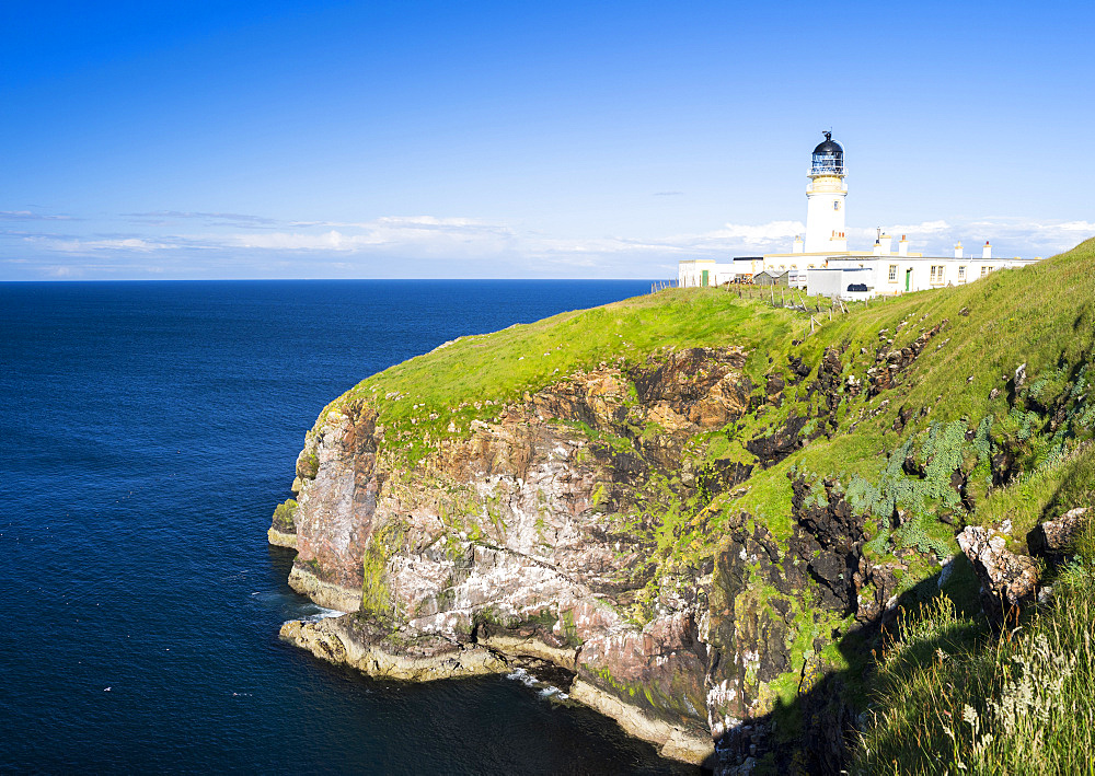 Isle of Lewis, part of the island Lewis and Harris in the Outer Hebrides of Scotland. Coast and lighthouse at Tiumpan Head (Rubha an t Siumpain), Eye Peninsula. Europe, Scotland, July