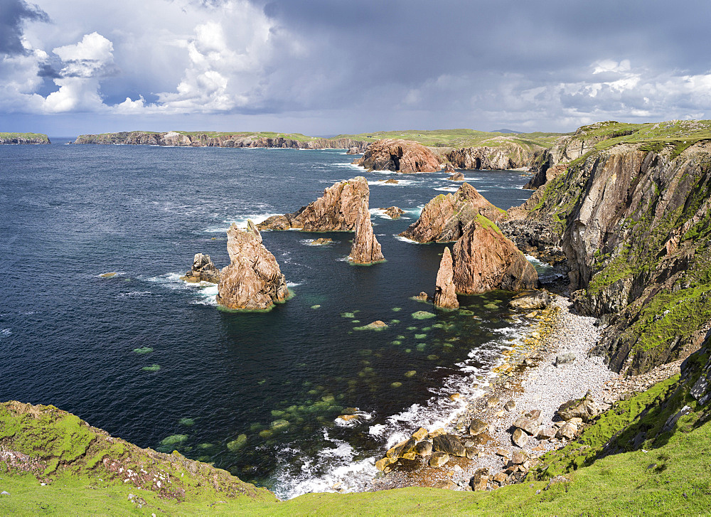 Isle of Lewis, part of the island Lewis and Harris in the Outer Hebrides of Scotland. The cliffs and sea stacks near Mangersta (Mangurstadh) in Uig. Europe, Scotland, July