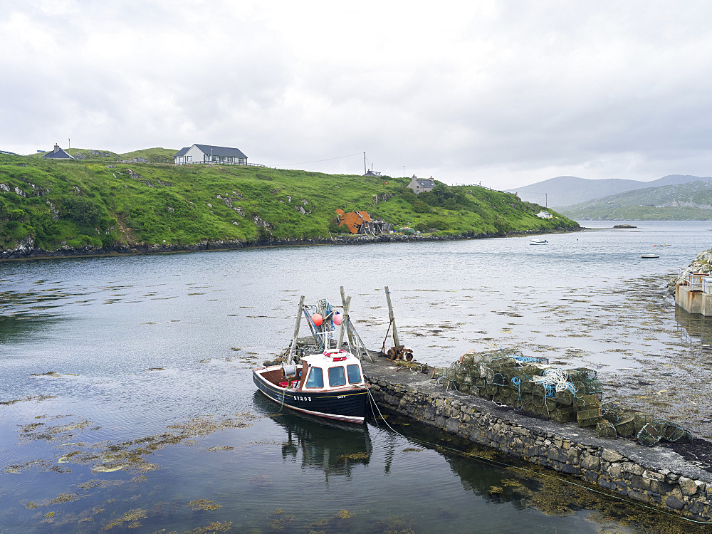 Scalpay, Outer Hebrides, a small island close to the Isle of Harris. Only the construction of a bridge to Harris saved the population of Scalpay. Without the bridge, the island would habe been abandoned, an example of successfull rural regional development in Scotland. Europe, Scotland, July