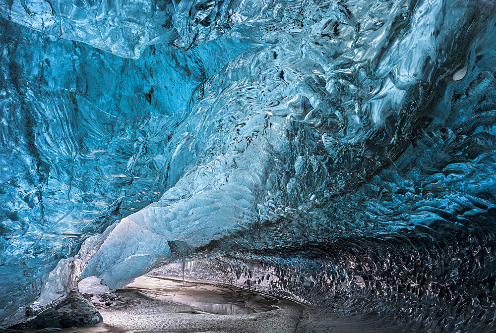 Glacial cave in the Breidamerkurjoekull Glacier in Vatnajoekull National Park. Entrance to the Ice Cave europe, northern europe, iceland,  February