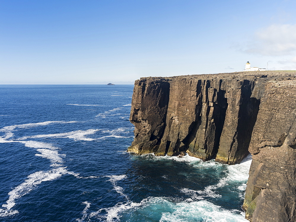 Landscape on the Eshaness peninsula. The famous cliffs and sea stacks of Eshness, a major attraction on the Shetland Islands. the cliffs are a major part of the Geopark Shetland, showing a cross section of a 395 mio years old vulcano  europe, central europe, northern europe, united kingdom, great britain, scotland, northern isles,shetland islands, May