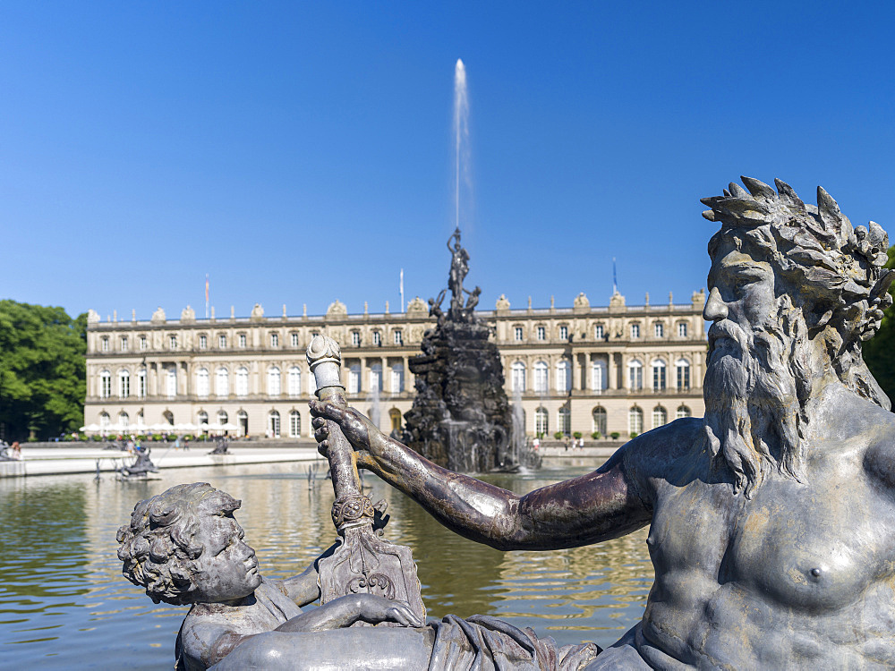 Herrenchiemsee Palace, located on an island in lake Chiemsee, upper bavaria. The western facade called Gartenfassade with the french garden and the famous water games, Europe, central europe, germany, bavaria