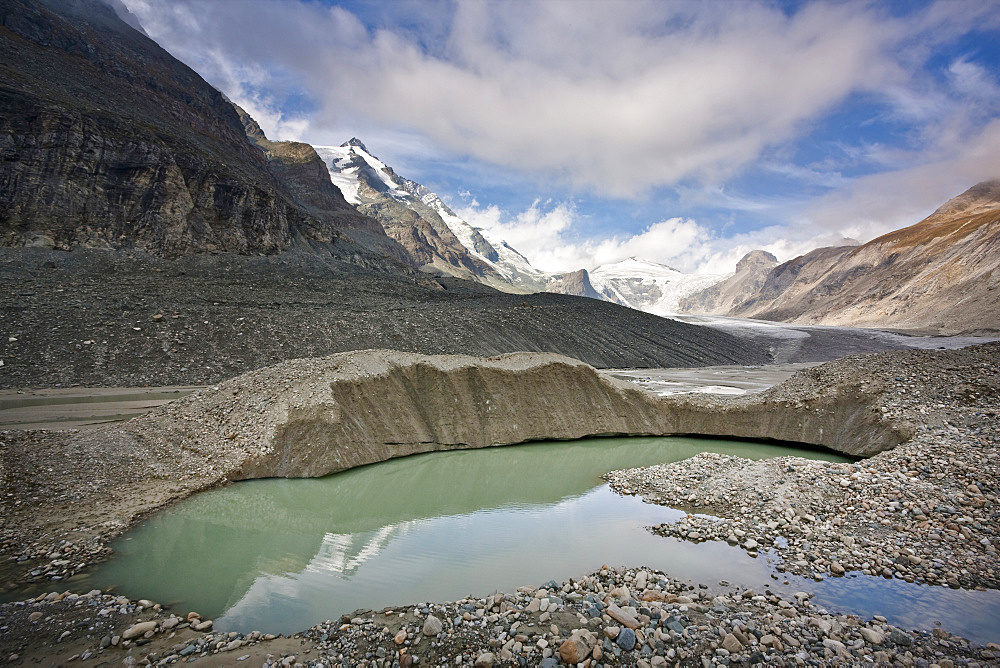 Glacier foreland and desintegration moraine landscape of glacier Pasterze near Grossglockner  with lakes formed by melting of dead ice lakes. Beneath the thick cover of till huge masses of glacier ice still exists, wehn melting they form lakes and other ice desintegration landforms, Europe, central europe, Austria