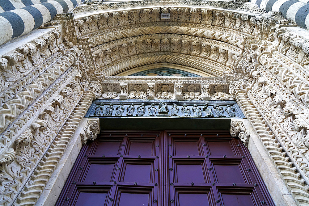 Side door, Cathedral Basilica of Santa Maria Assunta is the main Catholic place of worship in Orvieto, and a masterpiece of Gothic architecture in Central Italy, Umbria, Italy, Europe