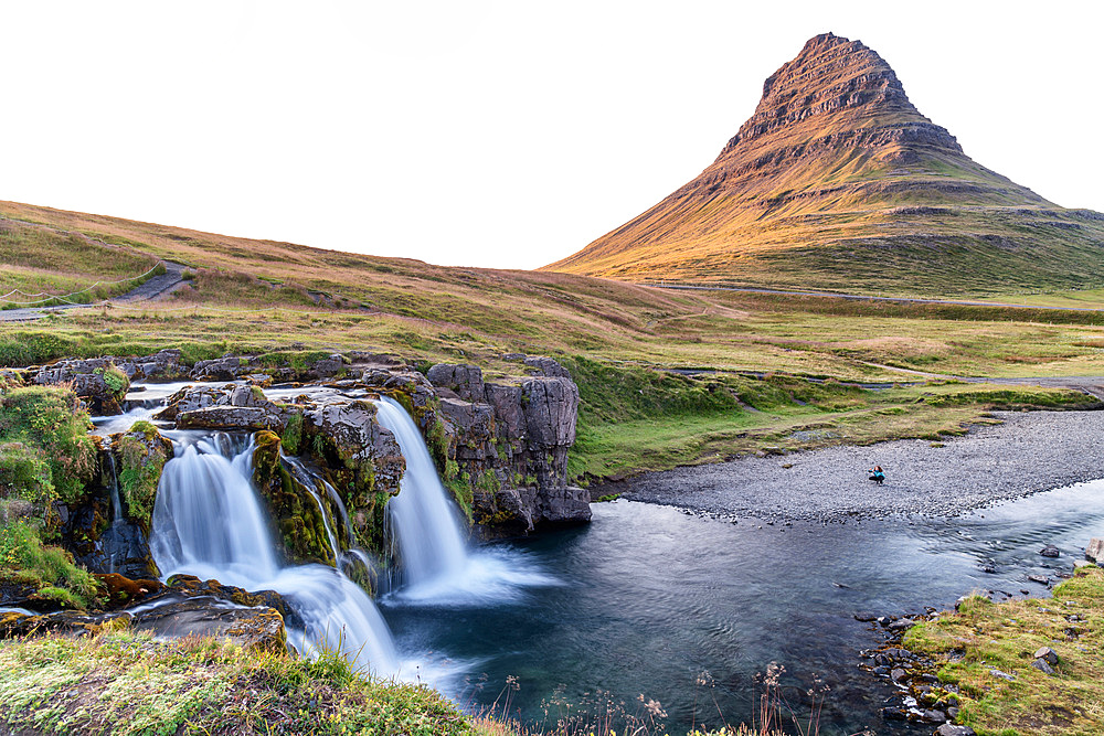 Kirkjufell Mountain and Waterfalls, Snaefellnes Peninsula, Iceland. Long exposure with moving water in summer season