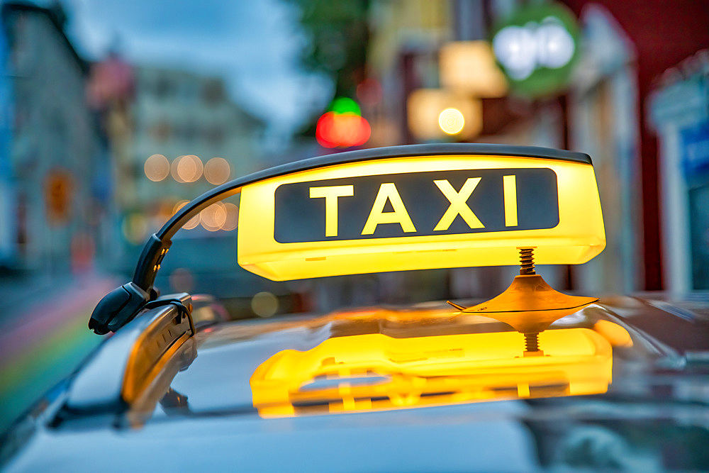 Taxi cab yellow sign in Reykjavik, Iceland.