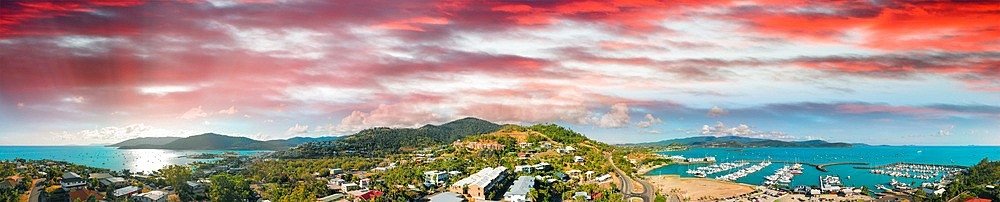 Panoramic aerial view of Airlie Beach skyline and Marina, Australia.