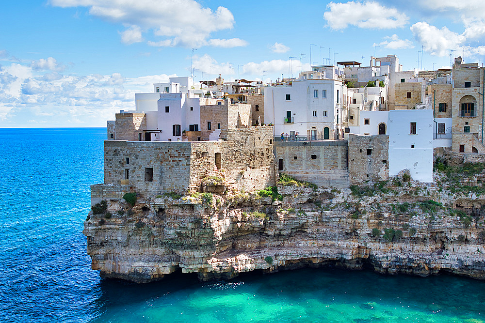 Polignano a Mare - Apulia, Italy. Beautiful aerial view of cityscape and coastline on a beautiful summer day.