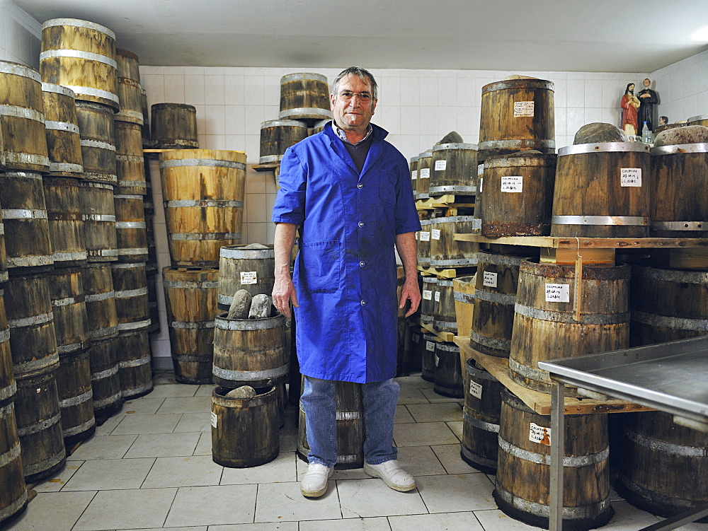 Portrait of Battista, fisherman and owner of the company Delfino which produces oil and salted anchovies, tuna and the famous Anchovy sauce called Colatura, Cetara, Amalfi Coast, Campania, Italy.