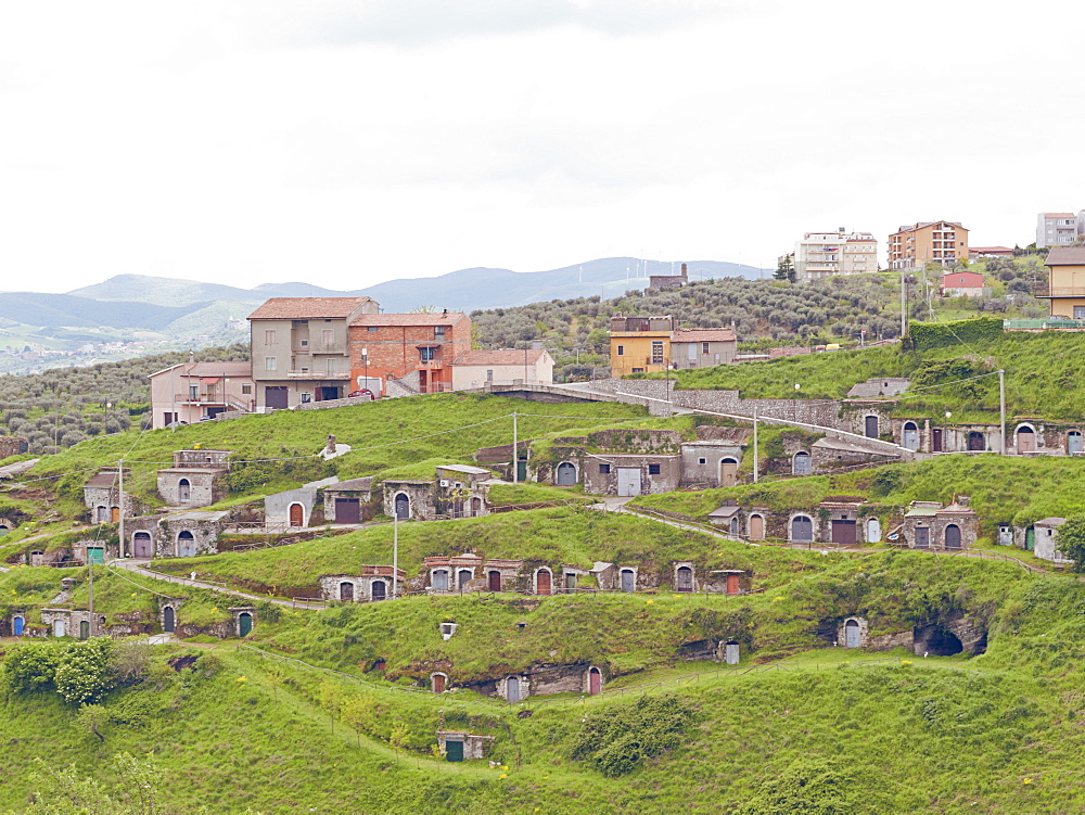 Antique barrels dug into the mountain. Here it is preserved the wine for thousands of years. In this village the director Pier Paolo Pasolini shot part of his film Il Vangelo Secondo Matteo, Barile, Basilicata, Italy, Europe