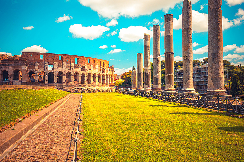 Roman roads upon the Palatine Hill with beautiful view on Coliseum in background, Rome, Lazio, Italy, Europe