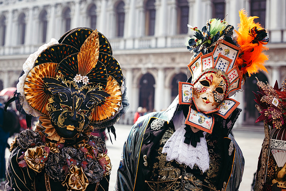 Portrait of a couple with beautiful masks in Venice, Veneto, Italy, Europe