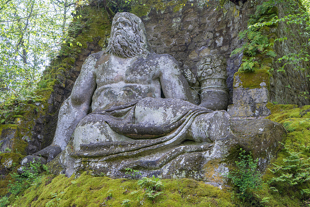 Neptune, the Sacro Bosco, Sacred Grove colloquially called Park of the Monsters, XVI century, Parco dei Mostri in Italian, Bomarzo, Lazio, Italy, Europe