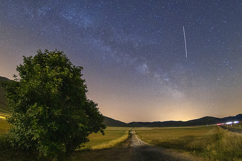 Sibillini Mountains National Park, View of the Milky Way on the Pian Grande, Castelluccio di Norcia, Umbria, Italy, Europe