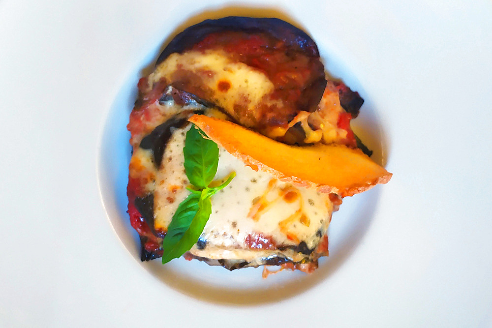 Paarmigiana, traditional Italian recipe baked in the oven with eggplant, tomato, cheese and basil, Italy, Europe