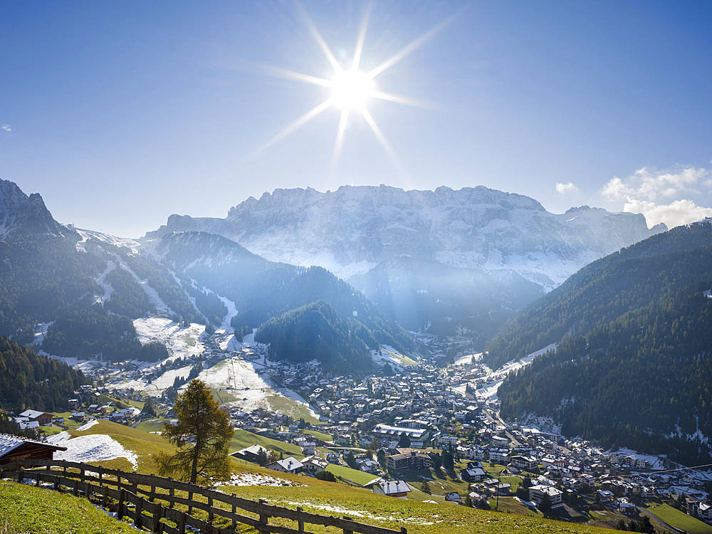 Sella mountain range and village Wolkenstein - Selva in the dolomites of South Tyrol - Alto Adige seen from Groeden Valley - Val Gardena. The dolomites are listed as UNESCO World heritage. Europe, Central Europe, Italy, October