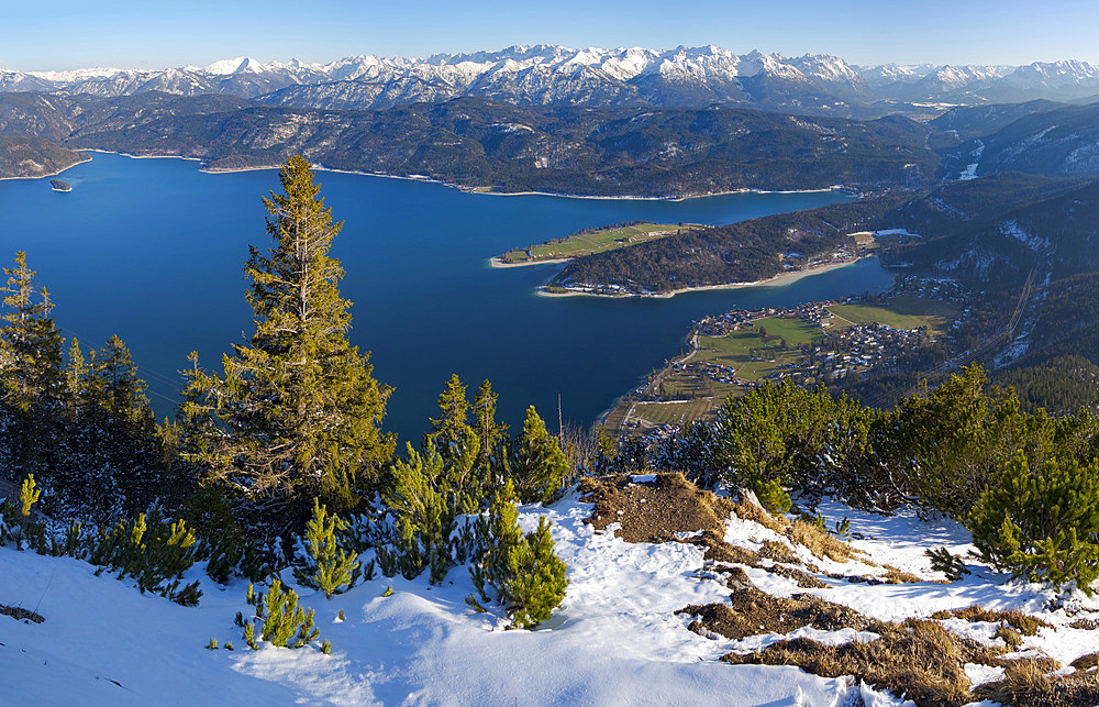 The view from Mt. Fahrenbergkopf towards lake Walchensee and Karwendel mountain range during winter in the bavarian Alps. Europe Germany, Bavaria