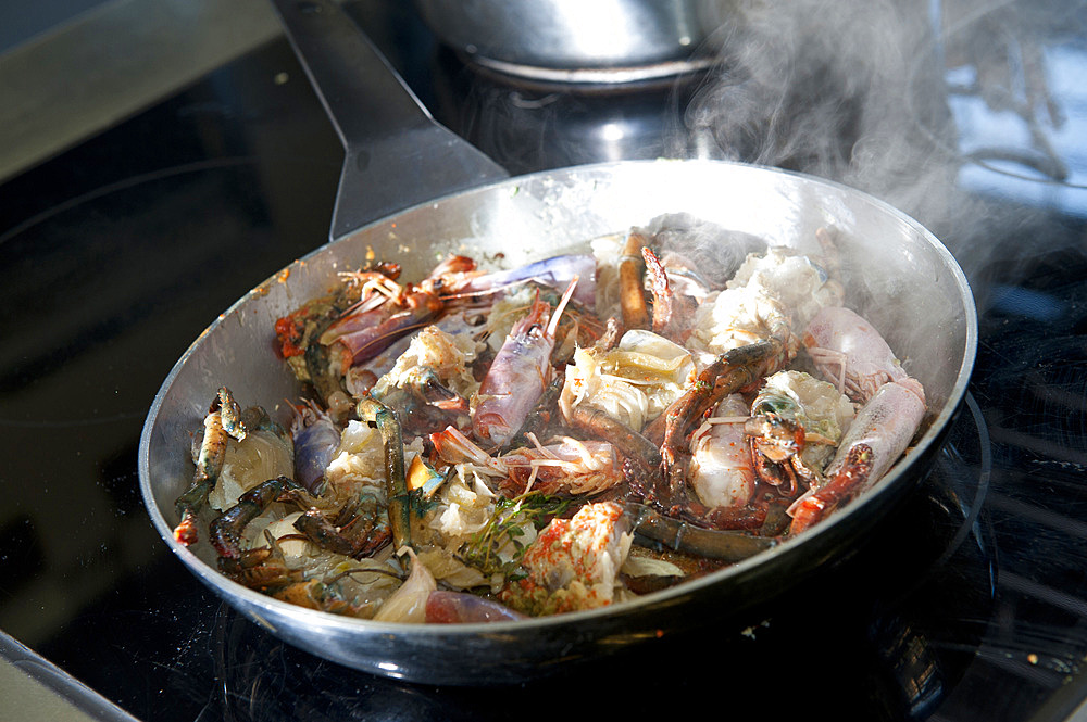 Preparation of a crustacean bisque. Italy