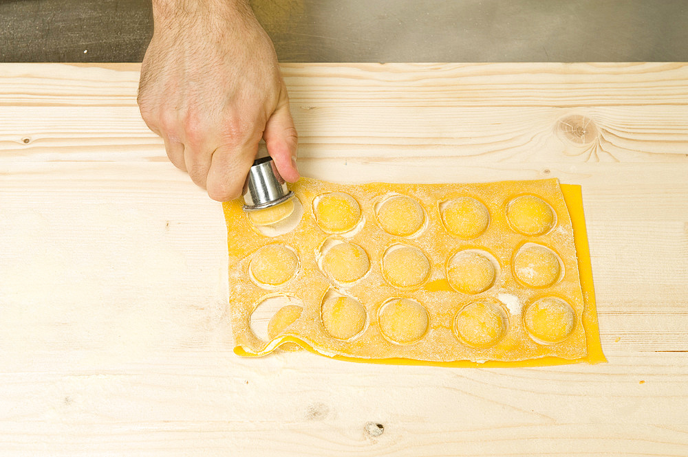 Making Tortelli from fresh pasta by hand. Italy