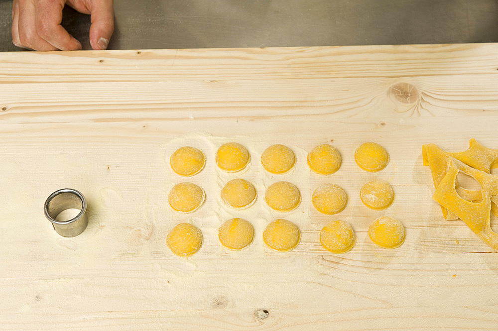 Making Tortelli from fresh pasta by hand. Italy