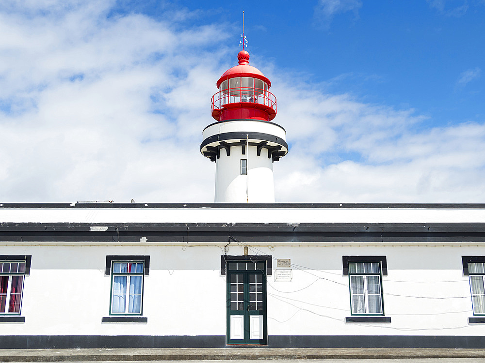 Ponta do Topo with lighthouse, at the eastern part of the island. Sao Jorge Island, an island in the Azores (Ilhas dos Acores) in the Atlantic ocean. The Azores are an autonomous region of Portugal. Europe, Portugal, Azores